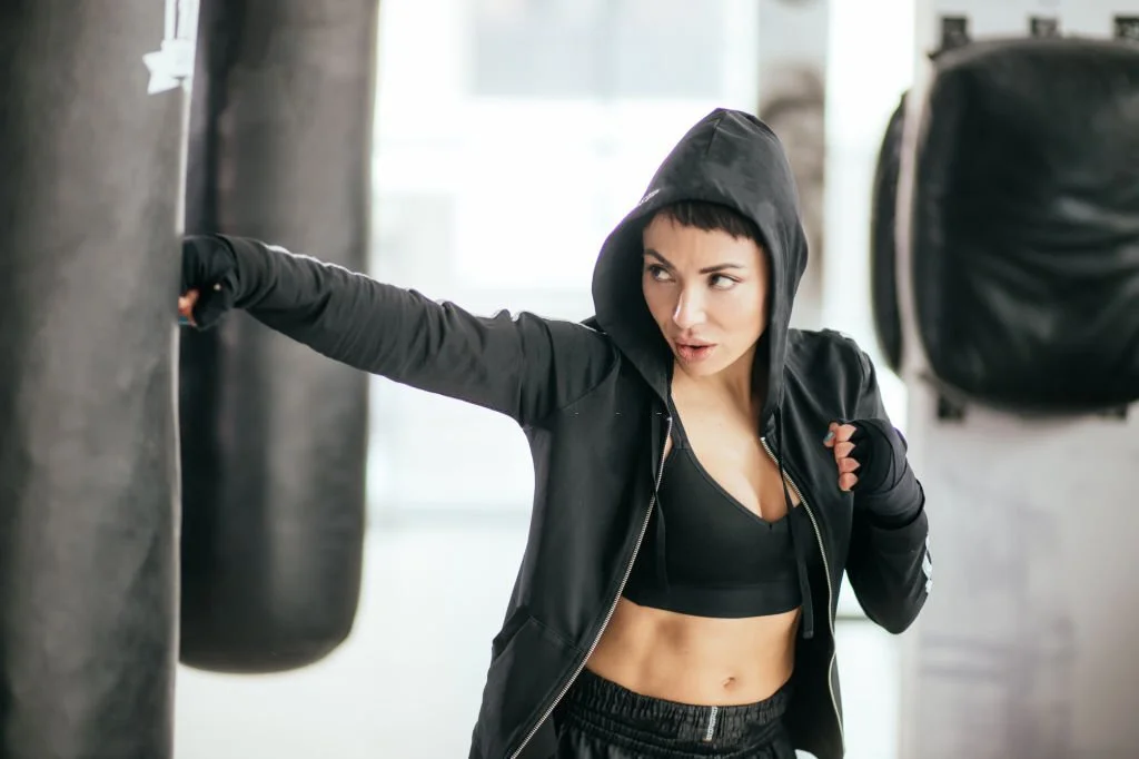 girl wearing hoodies for boxing practice